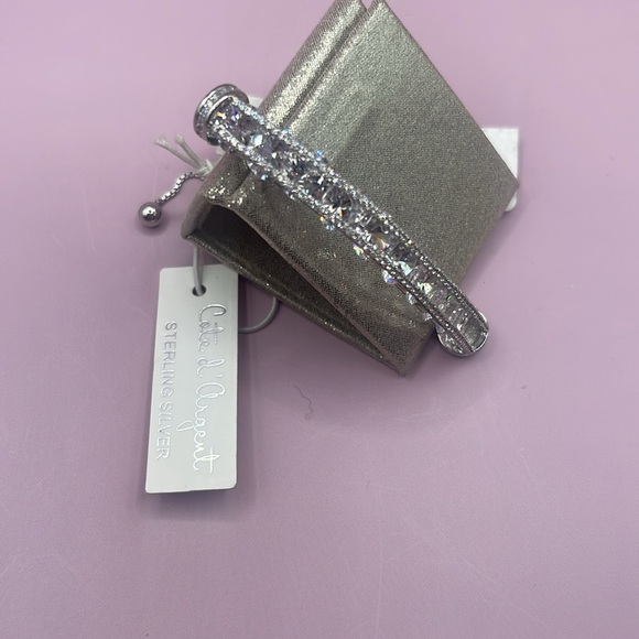 NWT🆕 Cate d’Argent 925 Sterling Silver Floating
CZ Channel Adjustable Bracelet - Picture 10 of 11
